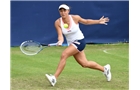 BIRMINGHAM, ENGLAND - JUNE 09:  Tamira Paszek of Austria returns a shot from Lauren Davis of United States on day one of the AEGON Classic Tennis Tournament at Edgbaston Priory Club on June 9, 2014 in Birmingham, England.  (Photo by Tom Dulat/Getty Images)